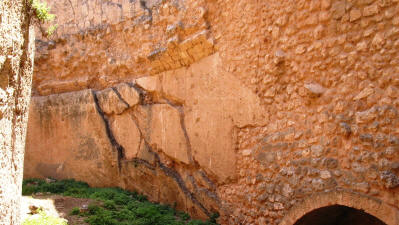 Walls built on existing rocky outcrops